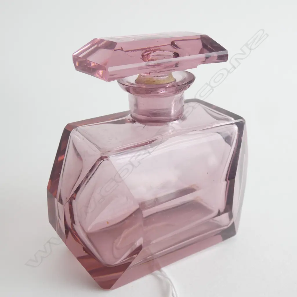 A glass perfume bottle Image 1++